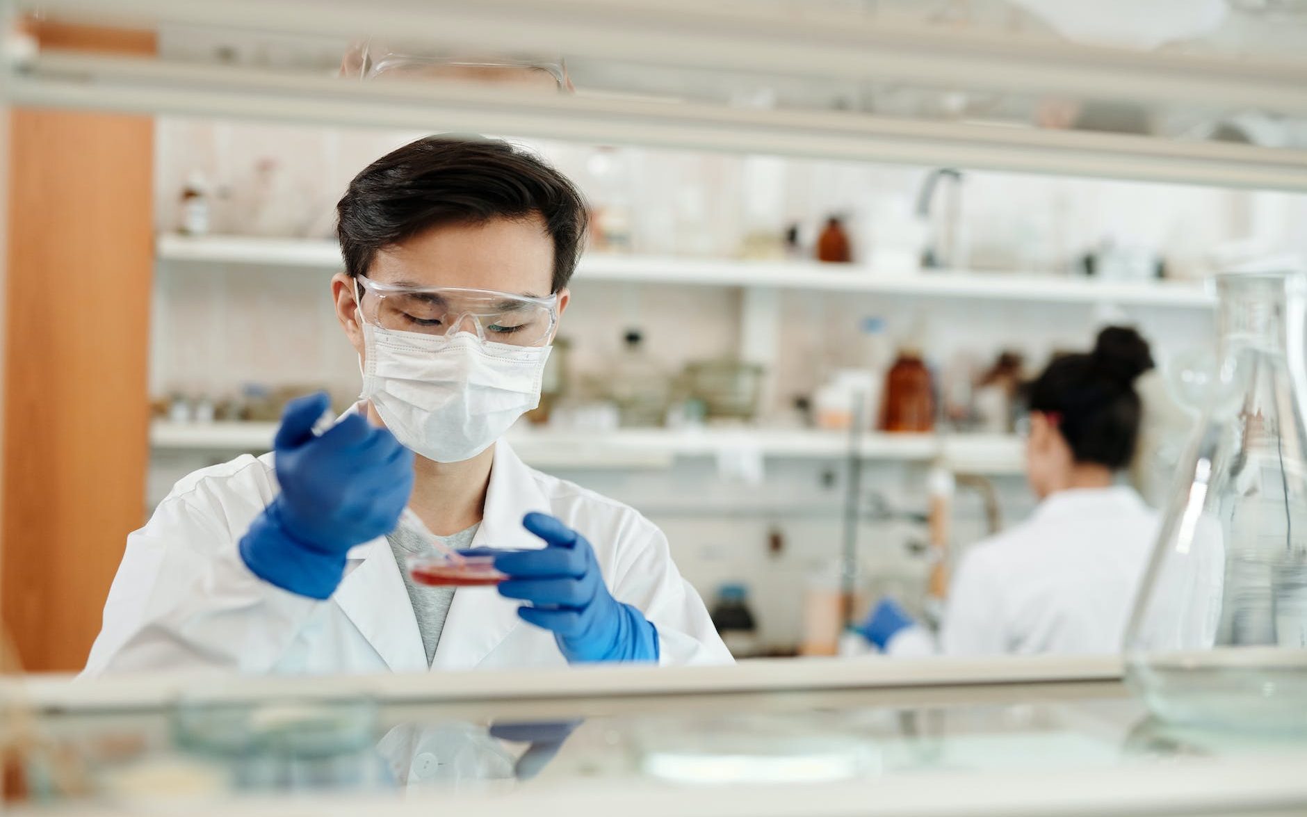 man doing a sample test in the laboratory